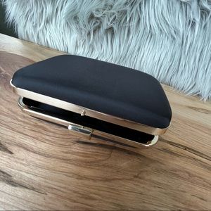 HUGO BOSS Square Hard shell Clutch. Black with Gold trim and clasp.